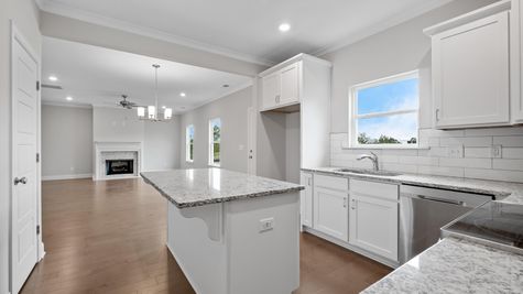 Interior photo of all white kitchen