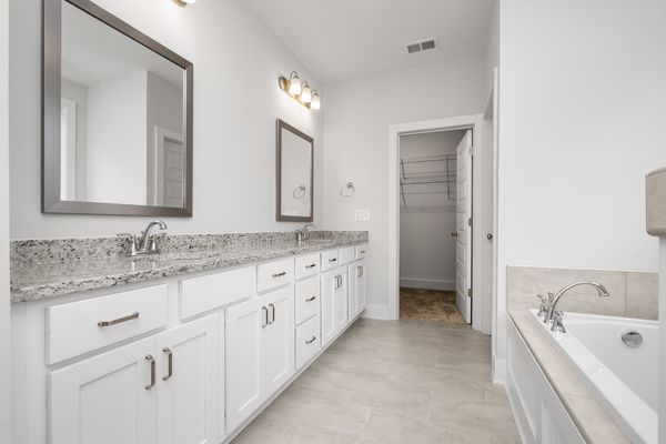 Interior photo of all white bathroom