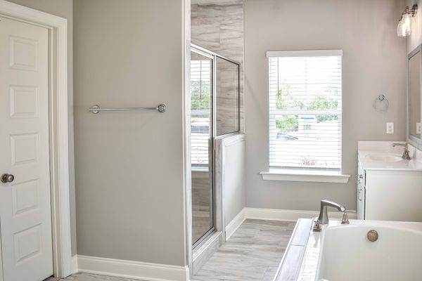 Interior photo of all white bathroom
