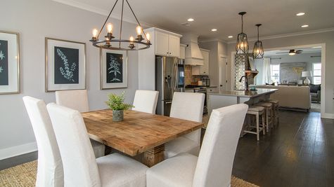 Interior of open concept kitchen with dining room