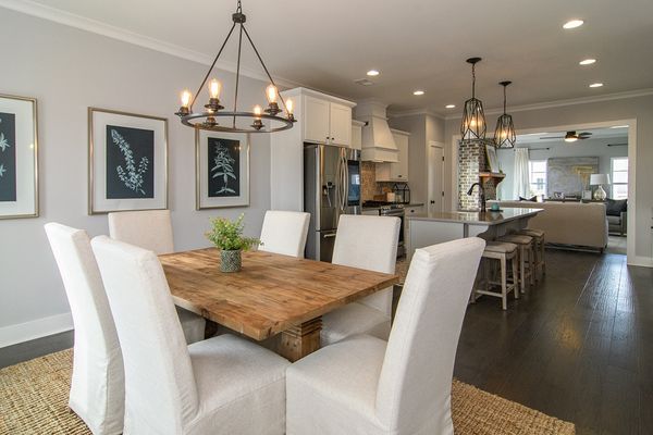 Interior of open concept kitchen with dining room
