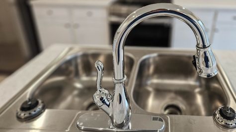 Detailed photo of kitchen sink faucet