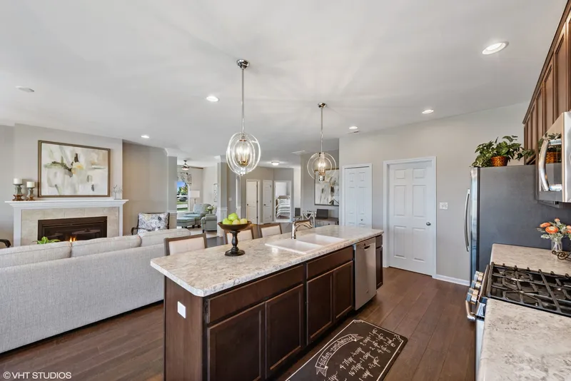 open floor plan in a new home in drakes pointe by olthof homes