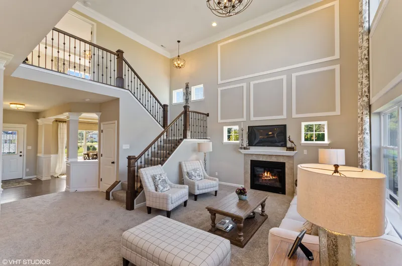 spacious living room in new home community in schererville, in built by olthof homes