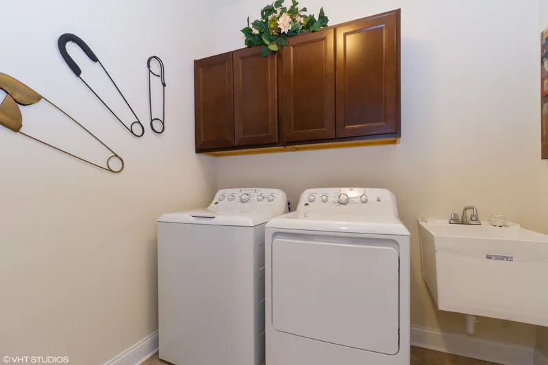 laundry room in a new construction home in portage in by olthof homes