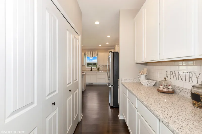 side kitchen in magnolia meadows community by olthof homes