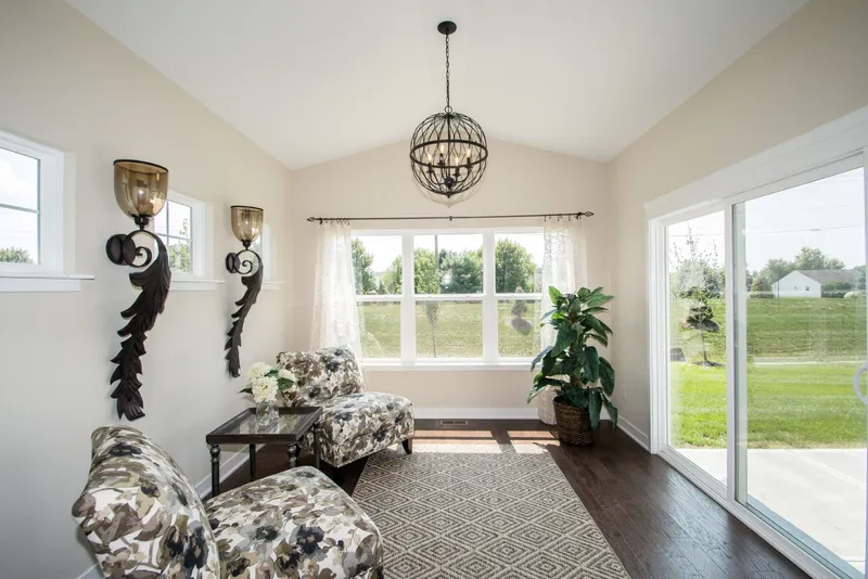 sunroom in a new home in the emerald crossing community by olthof homes