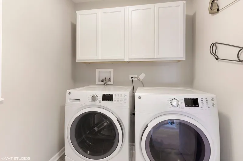 laundry room in a new home in canyon creek community by olthof homes