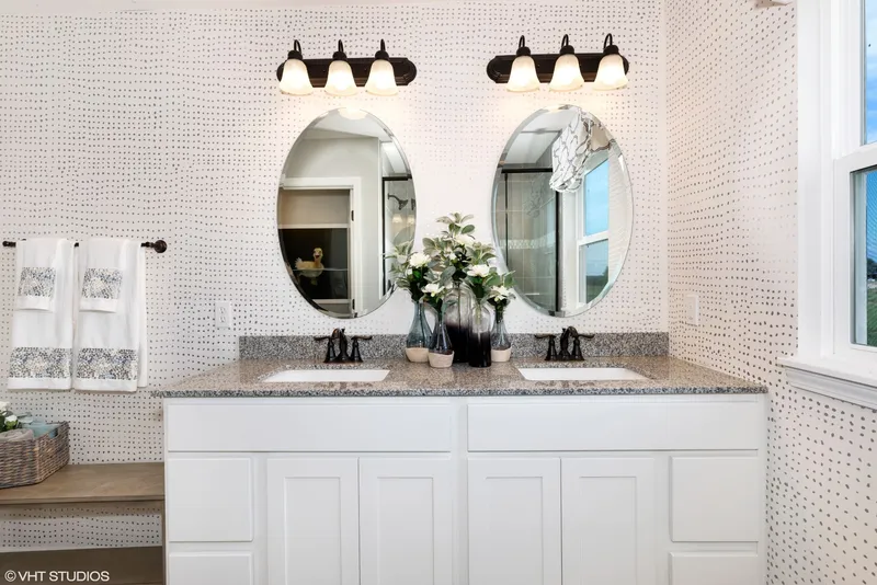 double vanity bathroom in a new home in brownsburg in built by olthof homes
