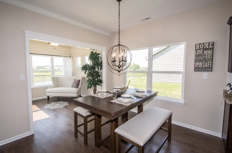 sunroom in a new home in emerald crossing community by olthof homes