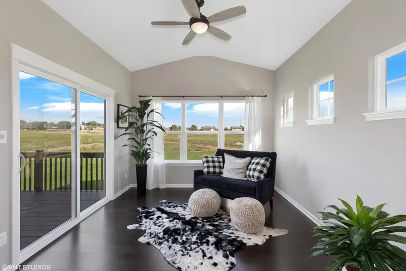 sunroom in a new construction home in clover grove by olthof homes