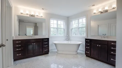Brandywine large master bathroom with two separate vanities & sinks plus soaking tub