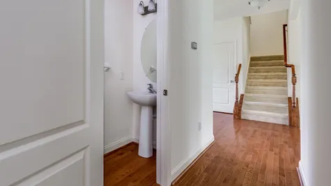 Powder Room and staircase in Augusta model home