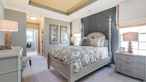 The Jasmine model new home, one story, in NJ master bedroom suite, decorated with sample furniture, carpet.