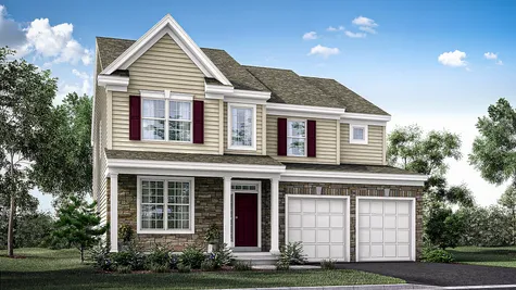 The Ashton Grand model new home in South Jersey , 2 stories with tan siding and stone front, maroon shutters, plus front veranda.