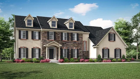 Exterior of Brandywine Manor luxury new home in South NJ with stone and stucco and dark shutters.