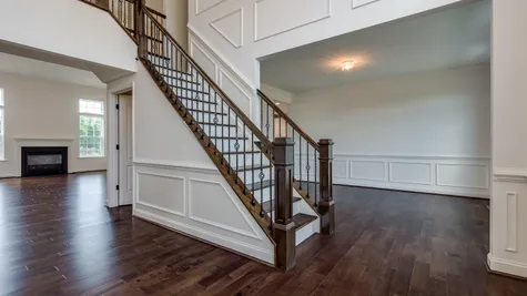 Baldwin model new home staircase with decorative handrails.