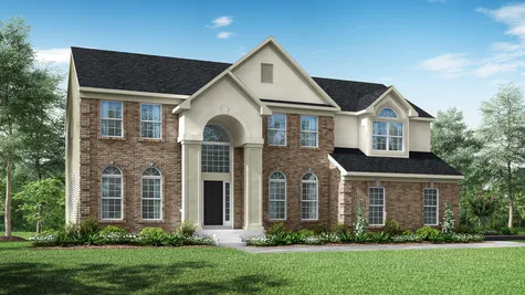 Oxford Traditional luxury new home in south Jersey with brick front, 2 story columns, peaked roof and palladian window over door, 2 car garage.