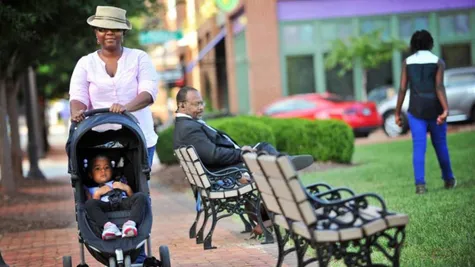 Village of Providence street scene mom stroller baby