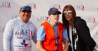 Image of Landon, Stacy and her son Zach at the C.A.S.T. for Kids Event.