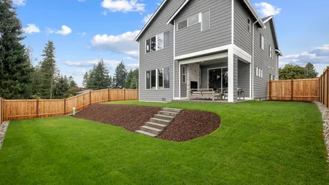 Fully landscaped yard with backyard fencing