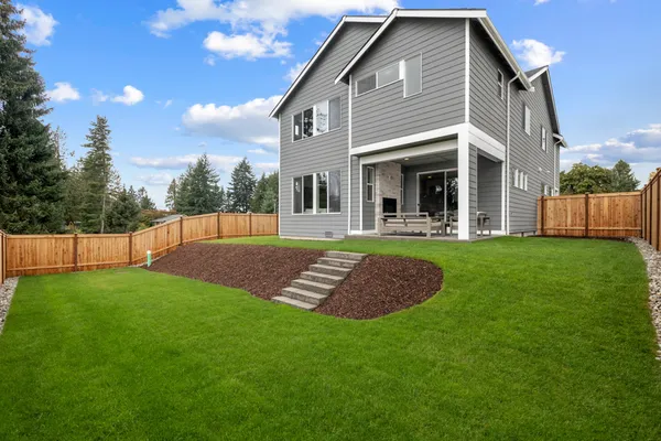 Fully landscaped yard with backyard fencing