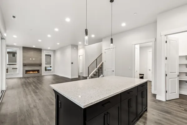 great room with kitchen island in foreground