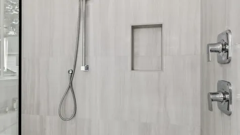 walk-in shower with two showerheads - rainshower and handheld