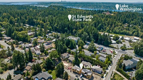 aerial view with Kenmore in the foreground, St Edwards State Park, and Lake Washington and Downtown Seattle in the distance
