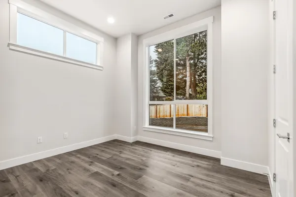 bedroom on main level with hard surface flooring