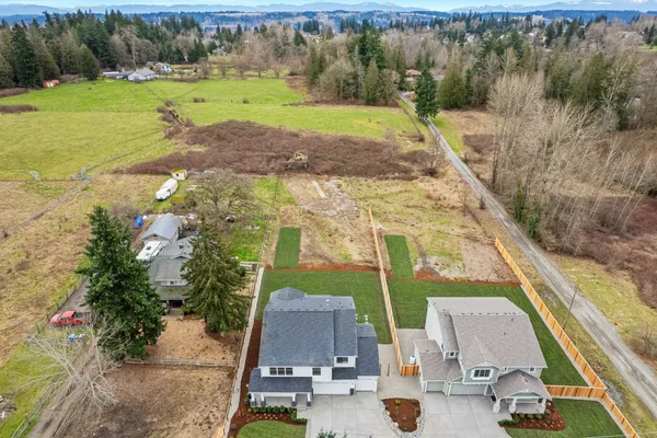 aerial shot of new home on a half acre+ lot