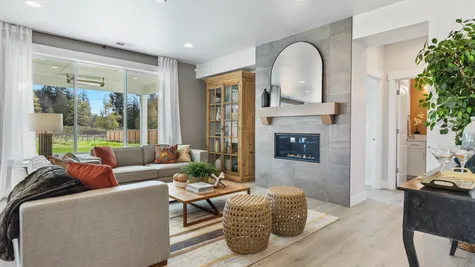 Contemporary fireplace with ceiling-height tile surround