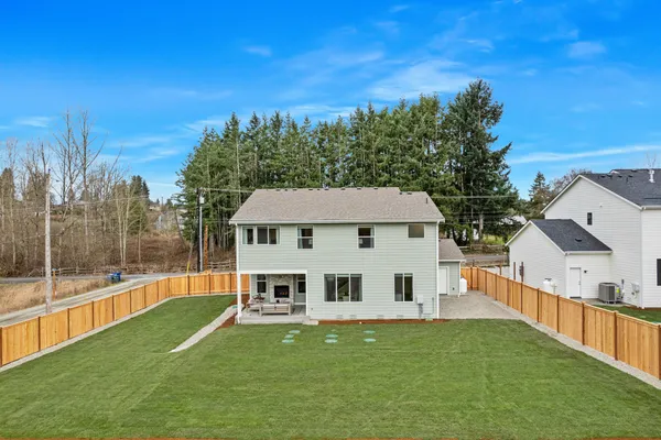 Nice level lot, with grassy backyard and fencing