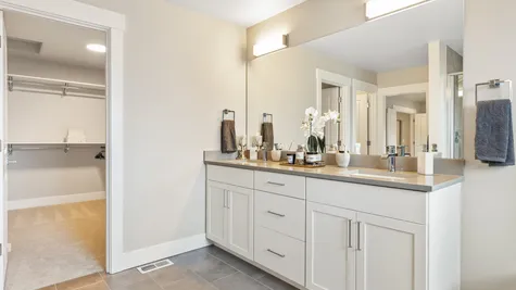 Dual sink vanity with slab quartz countertop