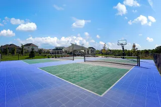 Professional-grade outdoor courts offer perfect recreational space under open blue skies.