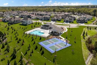 A vibrant master-planned neighborhood features premier recreational amenities surrounded by manicured lawns and rolling hills.