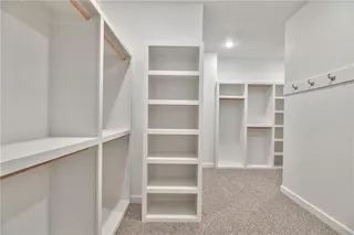 PHOTOS ARE OF ACTUAL HOME. Oversized Master Closet.