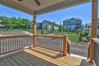 PHOTOS ARE OF ACTUAL HOME. Covered Deck