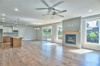 PHOTOS ARE OF ACTUAL HOME. View of Great Room with Gas Fireplace with Oversized