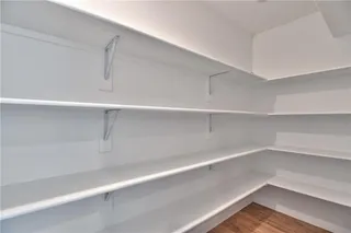 PHOTOS ARE OF ACTUAL HOME. Walk In Pantry Features Motion Light.