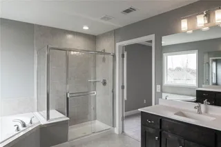 Master Bathroom. PICTURE IS OF PREVIOUS SPEC OR MODEL AND MAY FEATURE UPGRADES. NOT ACTUAL HOME.