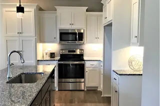 Kitchen. PICTURE IS OF PREVIOUS SPEC OR MODEL AND MAY FEATURE UPGRADES. NOT ACTUAL HOME.