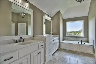 Master Bathroom. ICTURES ARE OF PREVIOUS SPEC OR MODEL HOME AND MAY FEATURE UPGRADES. NOT ACTUAL HOME.