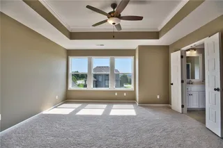 Master Bedroom. PICTURES ARE OF PREVIOUS SPEC OR MODEL HOME AND MAY FEATURE UPGRADES. NOT ACTUAL HOME.