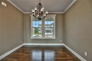 Formal Dining Room. PICTURES ARE OF PREVIOUS SPEC OR MODEL HOME AND MAY FEATURE UPGRADES. NOT ACTUAL HOME.