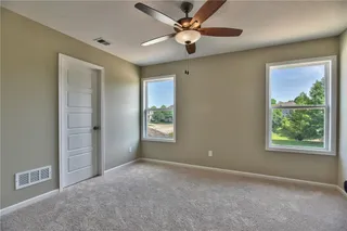 Bedroom 3. PICTURES ARE OF PREVIOUS SPEC OR MODEL HOME AND MAY FEATURE UPGRADES. NOT ACTUAL HOME.