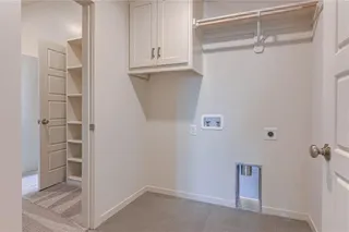 PICTURES ARE OF A PREVIOUS MODEL AND MAY CONTAIN UPGRADES.  NOT THE ACTUAL HOME.  LAUNDRY ROOM ON SECOND FLOOR OFF MASTER BEDROOM.