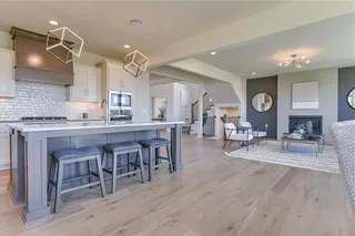 PICTURES ARE OF A PREVIOUS MODEL AND MAY CONTAIN UPGRADES. NOT THE ACTUAL HOME. LARGE KITCHEN ISLAND AND BREAKFAST BAR.