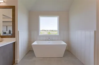 PICTURES ARE OF A PREVIOUS MODEL AND MAY CONTAIN UPGRADES. NOT THE ACTUAL HOME. FREE STANDING TUB IN MASTER BATHROOM.