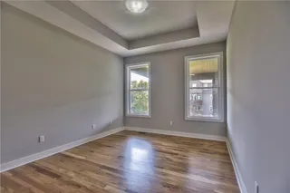 The Sonoma Reverse - Pictures are Not of Actual Home- First Floor Bedroom with Upgraded Hardwood Floors